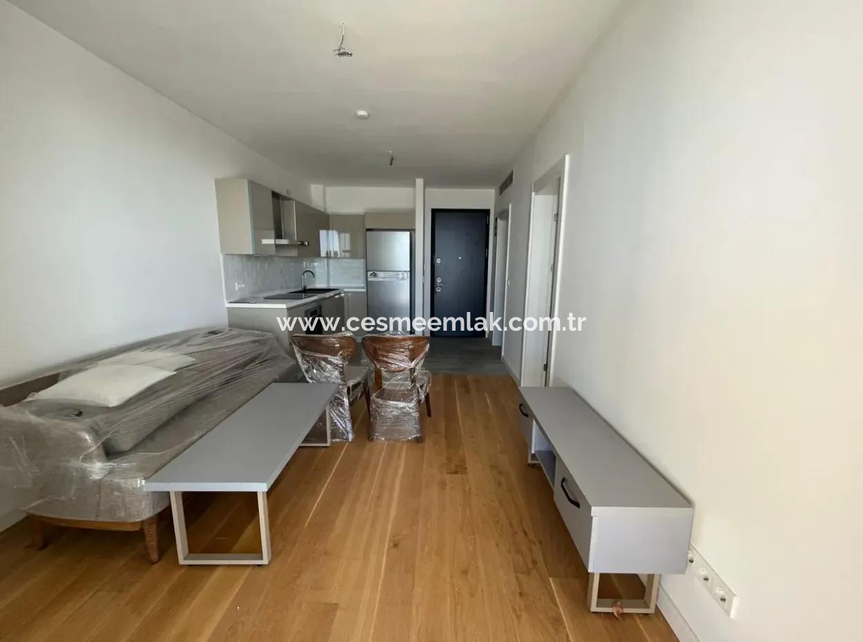 Wohnung Mit Infinity-Pool Zum Verkauf In Cesme Ayasaranda 2 1 Garten