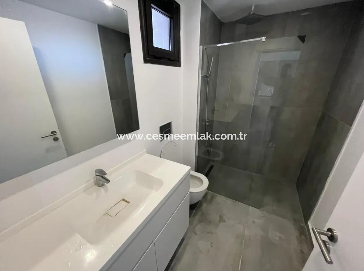 Wohnung Mit Infinity-Pool Zum Verkauf In Cesme Ayasaranda 2 1 Garten