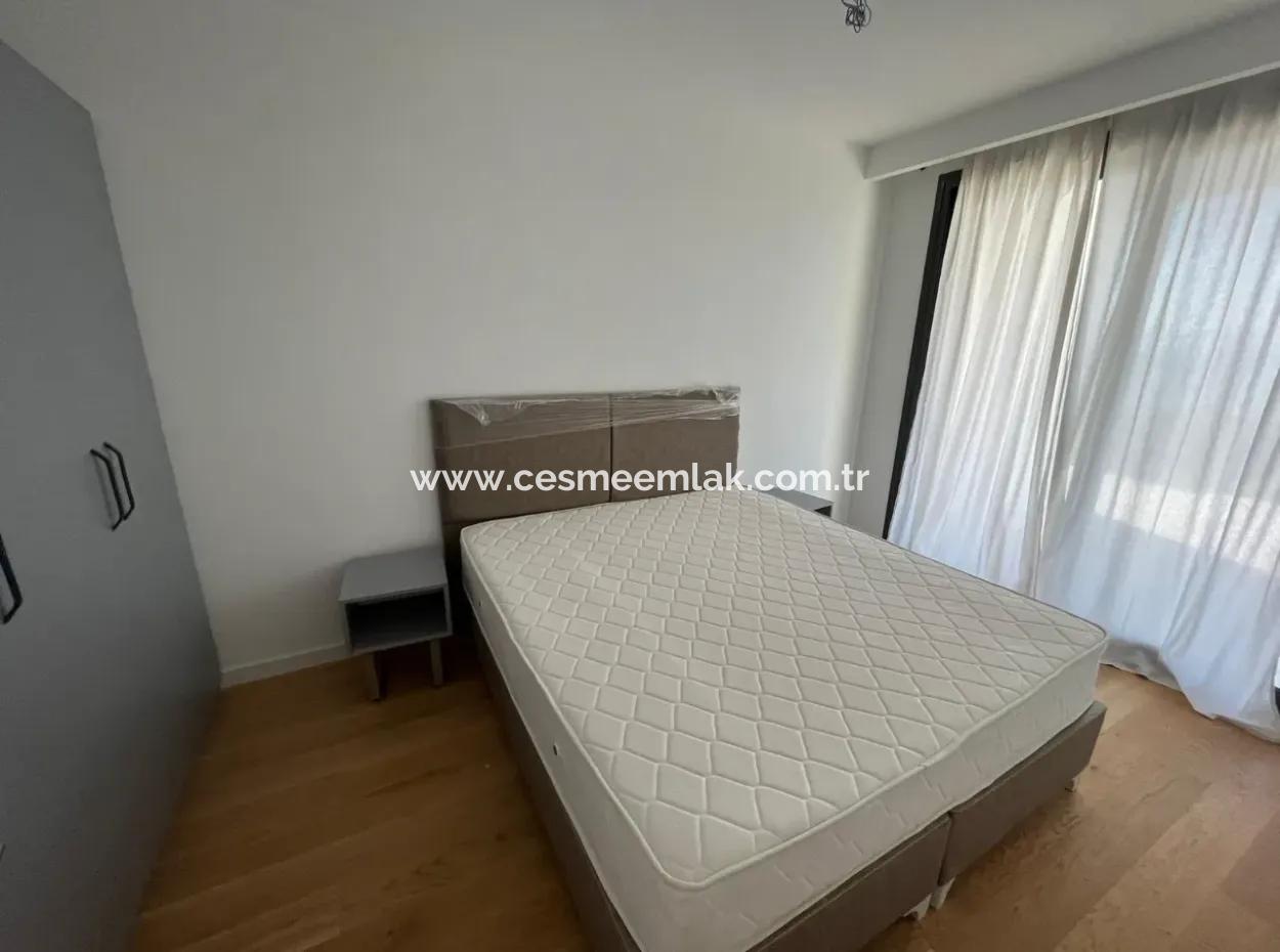 Wohnung Mit Infinity-Pool Zum Verkauf In Cesme Ayasaranda 2 1 Garten